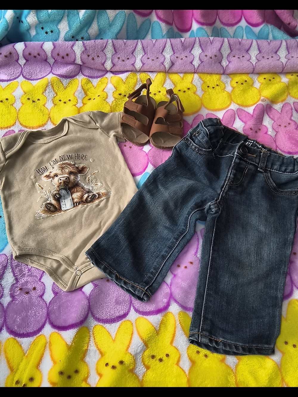 Neutral Newborn Bodysuit with Denim Baby Jeans and Brown Sandals
